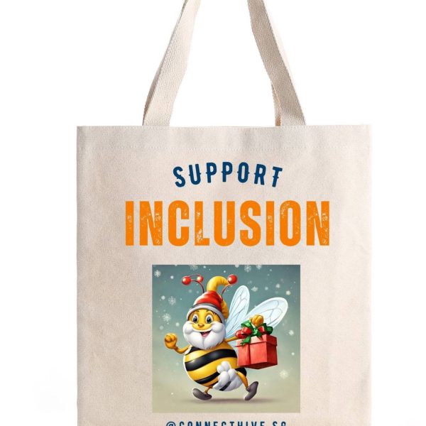 Beige raw tote bag with blue word "Support" , below is bigger orange font "INCLUSION" and a picture of Santa Bee holding a gift box in glittery background